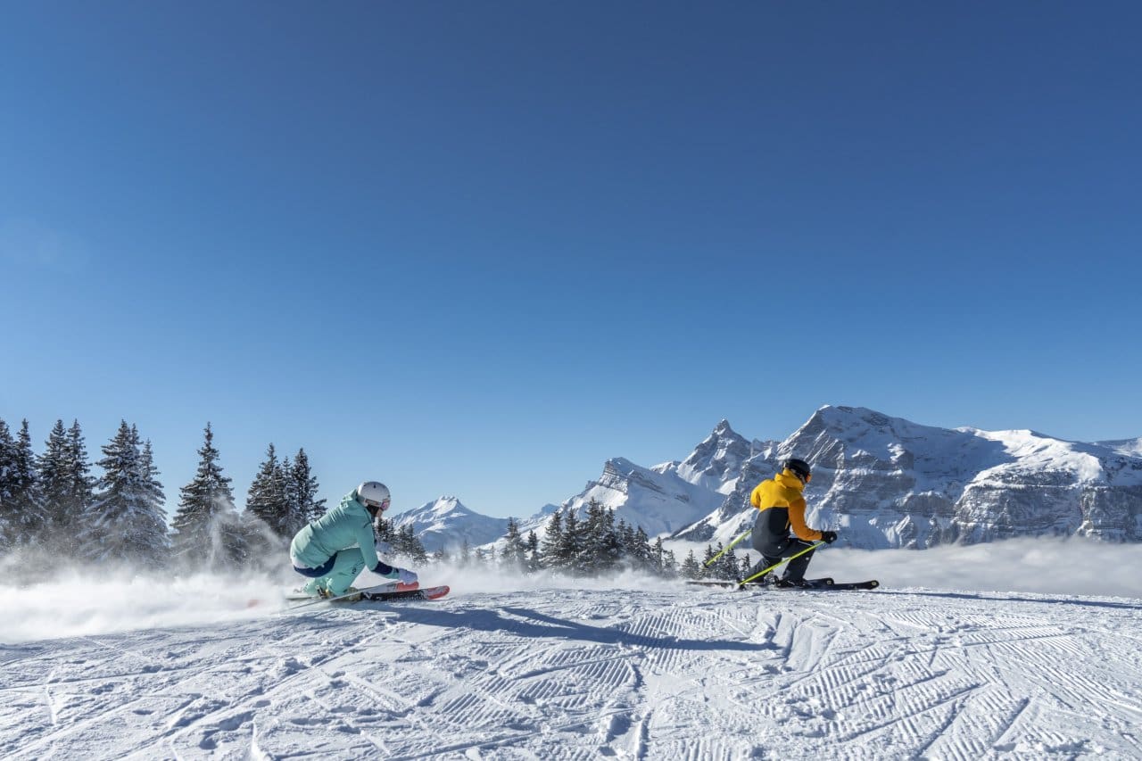 Downhill skiing - one of many winter activities in Les Carroz - Grand Massif Ski area. Credit Millo Moravski