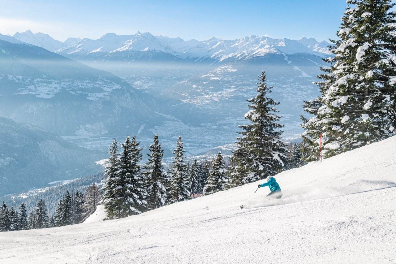 Downhill skiing in Anzere, Switzerland’s premiere mountain resort. Credit Henri Guanzini